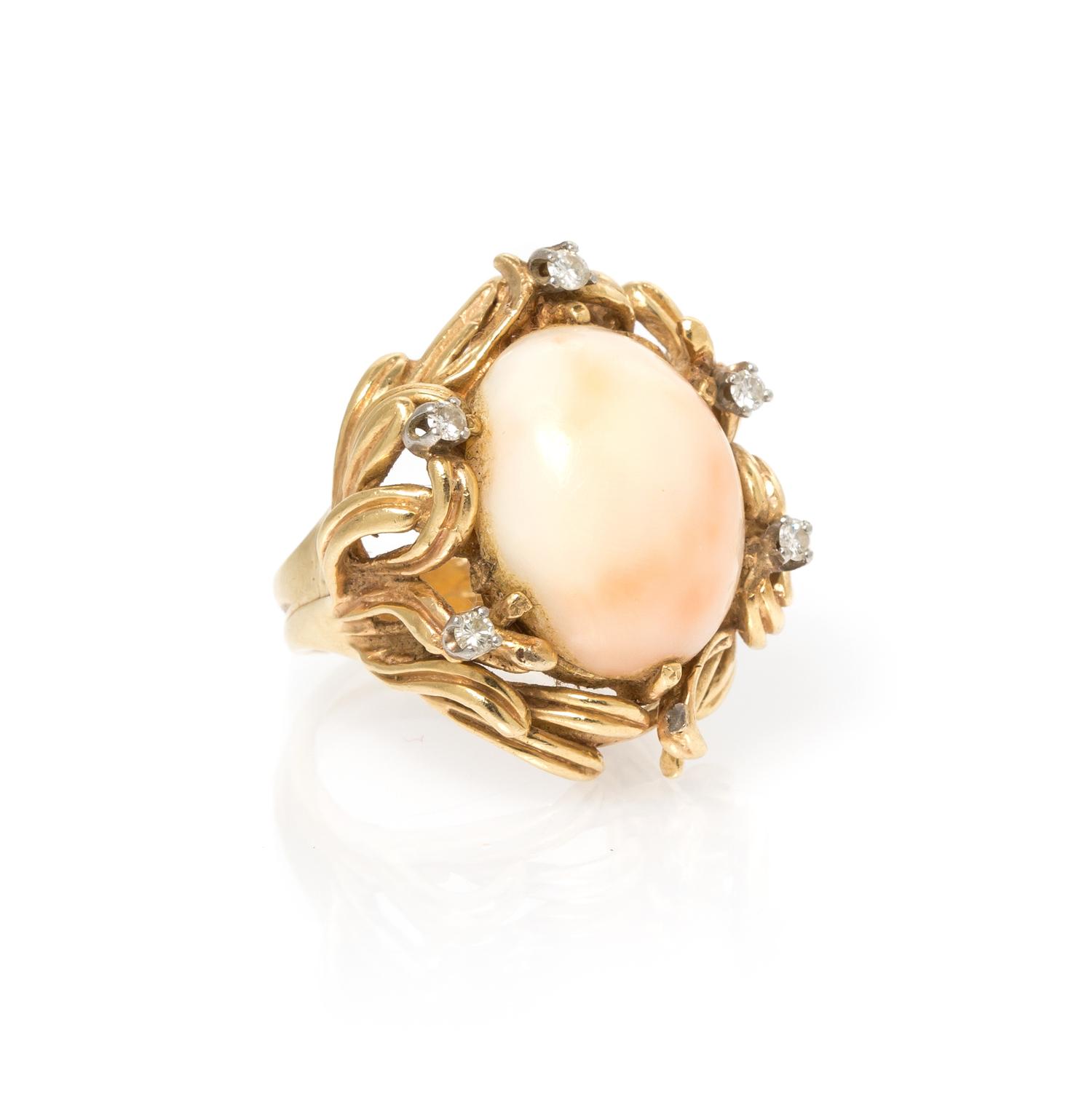 A Yellow Gold, Coral and Diamond Ring, 10.70 dwts.