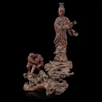 A large Chinese carved rootwood figural group depicting a meiren and monkeys 根雕美人与顽猴 Qing Dynasty ?