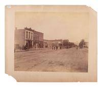 [WESTERN AMERICANA]. [JACKSON, W.H., photog.]. 2 photographs, incl. street scene and railroad view.