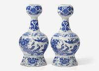 A Pair of Delft Blue and White Bottle Vases