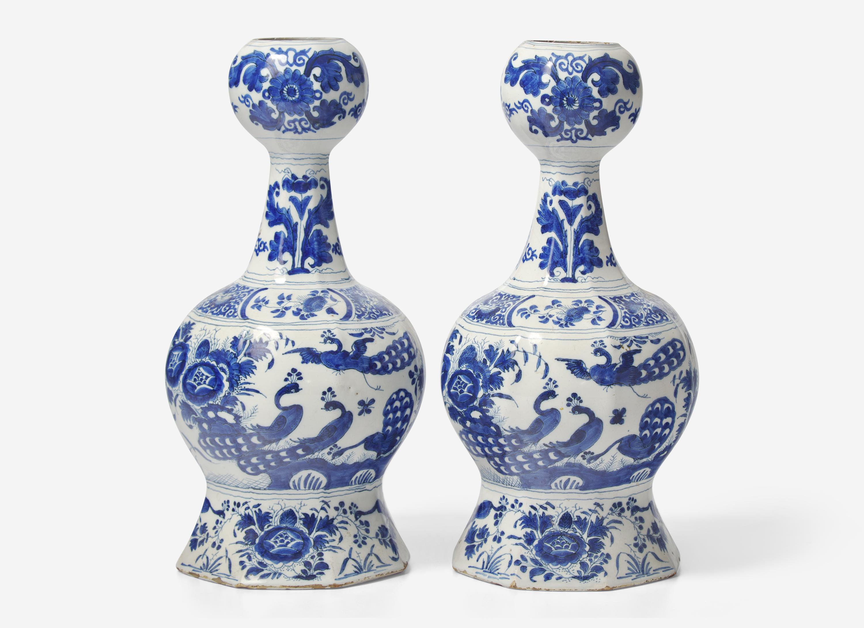 A Pair of Delft Blue and White Bottle Vases