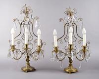 A Pair of Gilt Metal Three-Light Candelabra, Height 23 1/2 inches.