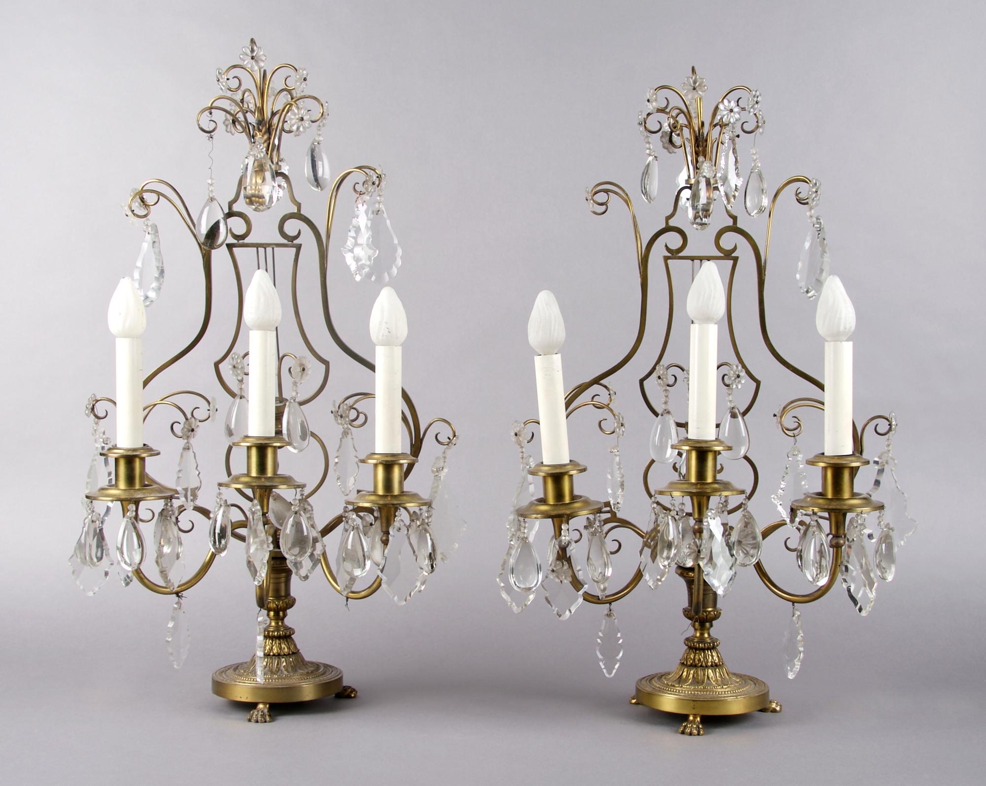 A Pair of Gilt Metal Three-Light Candelabra, Height 23 1/2 inches.