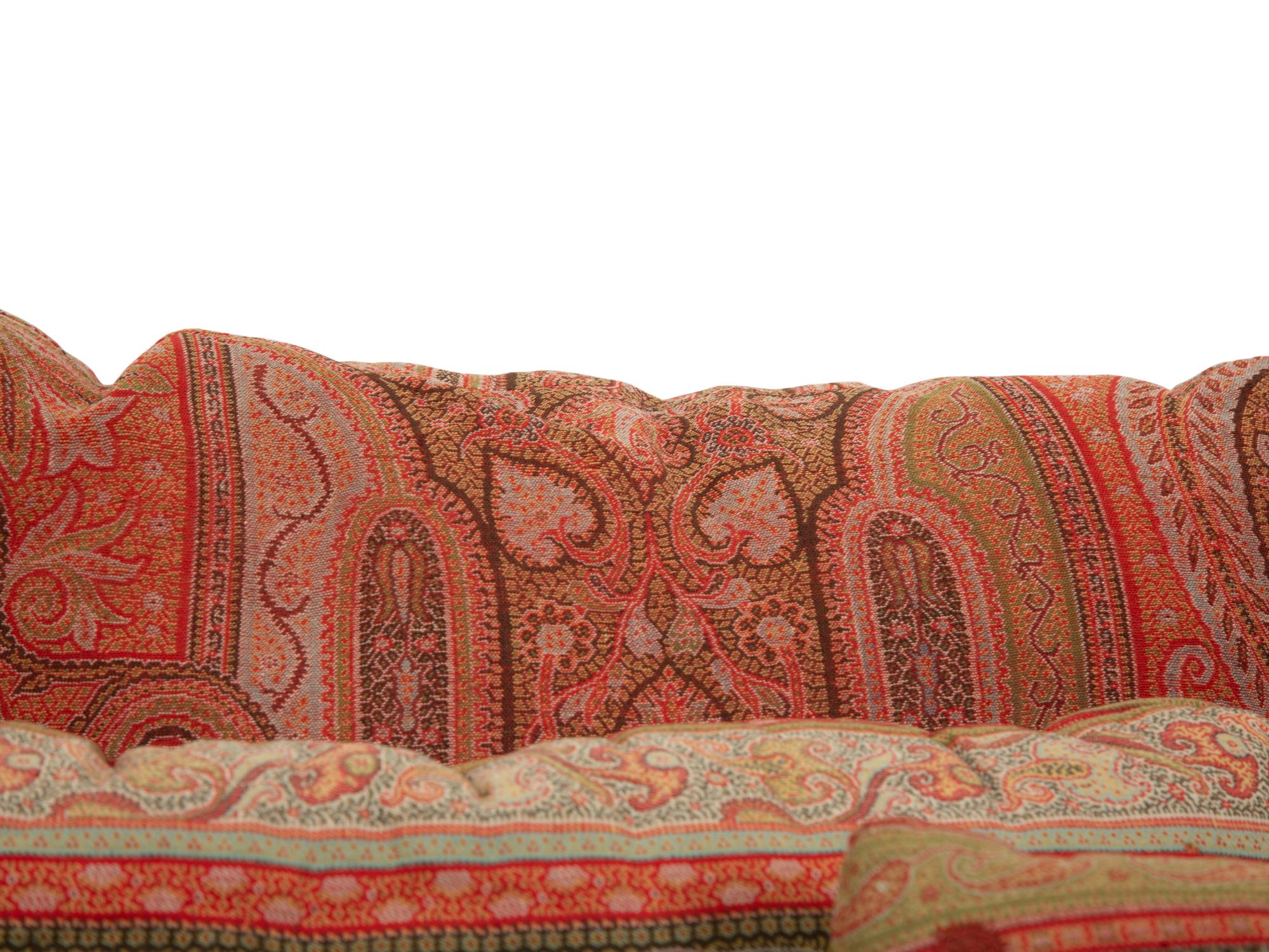 An Indian Paisley Wool Coverlet and Six Pillows