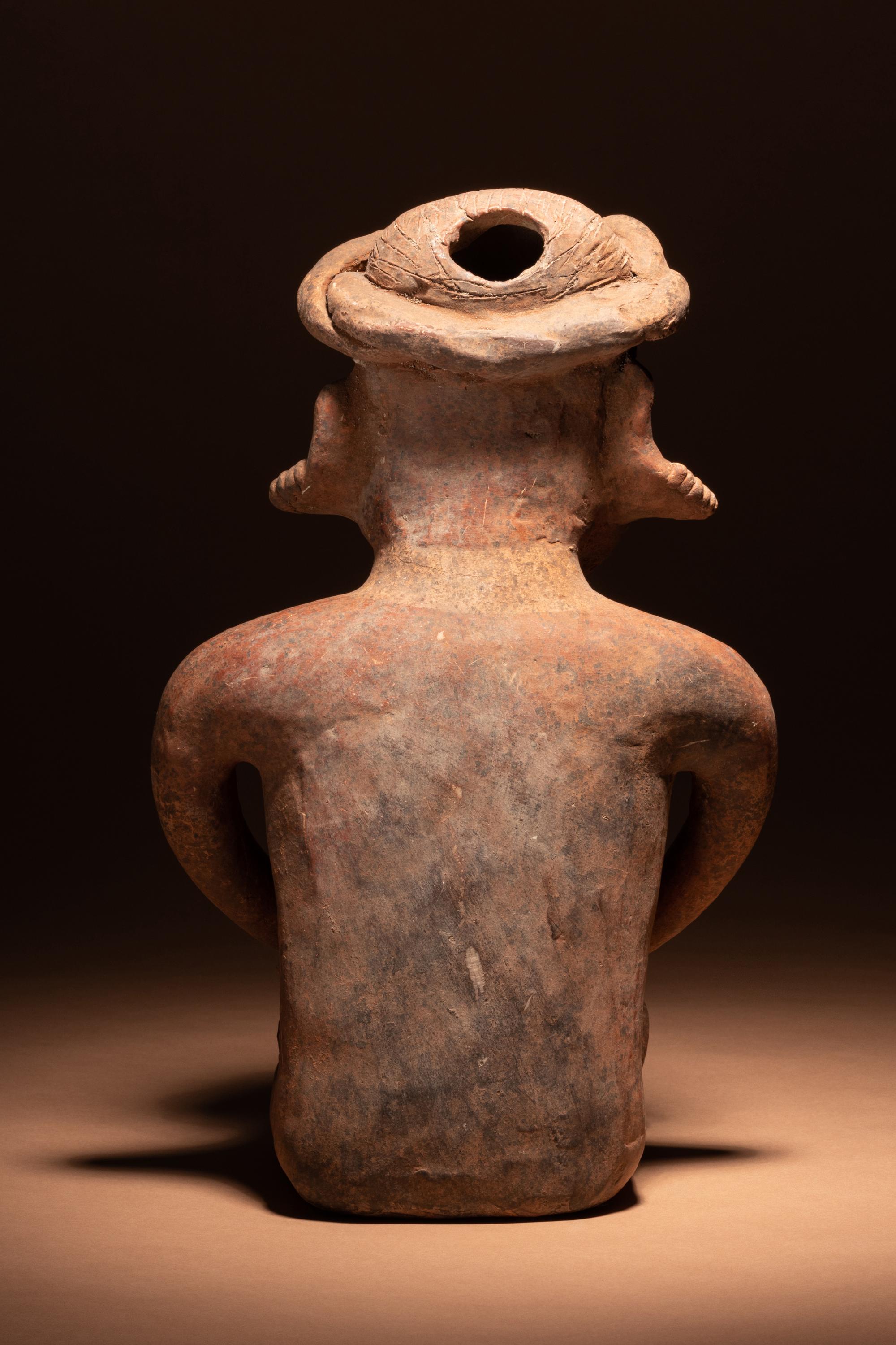 A Colima Terracotta Seated Mother and Child Figure