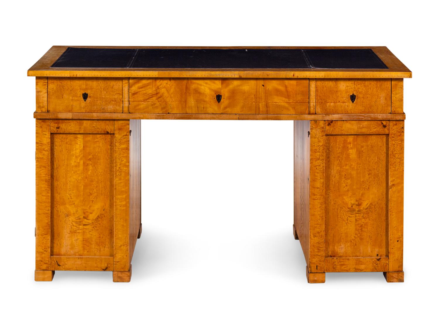 A Swedish Biedermeier Birch Pedestal Desk
