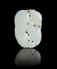 A Carved Jade Pendant Length 2 1/4 inches.