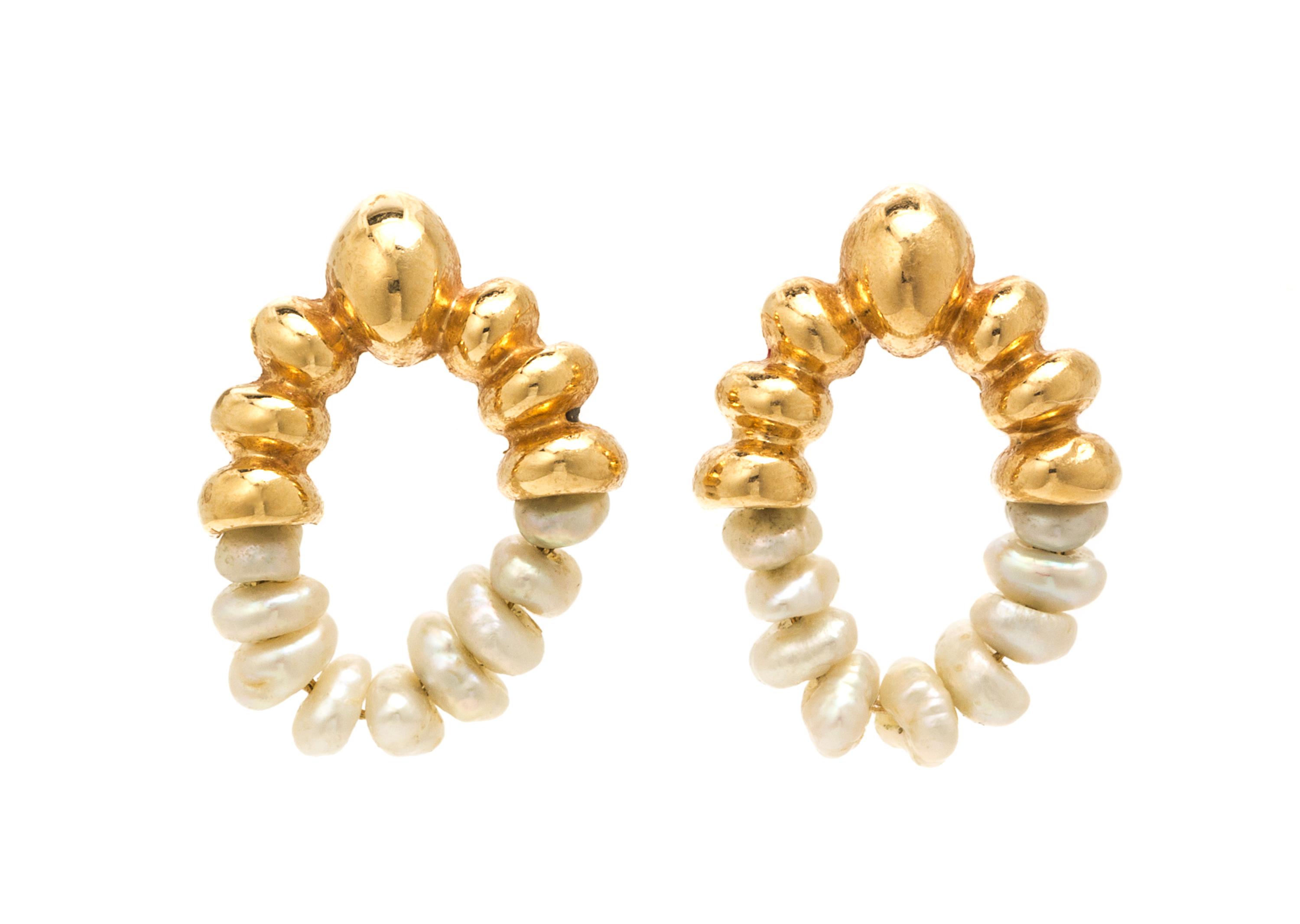 A Collection of 14 Karat Rose Gold Earrings, 4.10 dwts.
