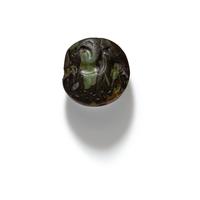 A Minoan Green Porphyry Lentoid with Two Gazelles