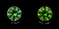 A Pair of Round Brilliant Cut Russian Demantoid Garnets Weighing 4.63 Carats Total,