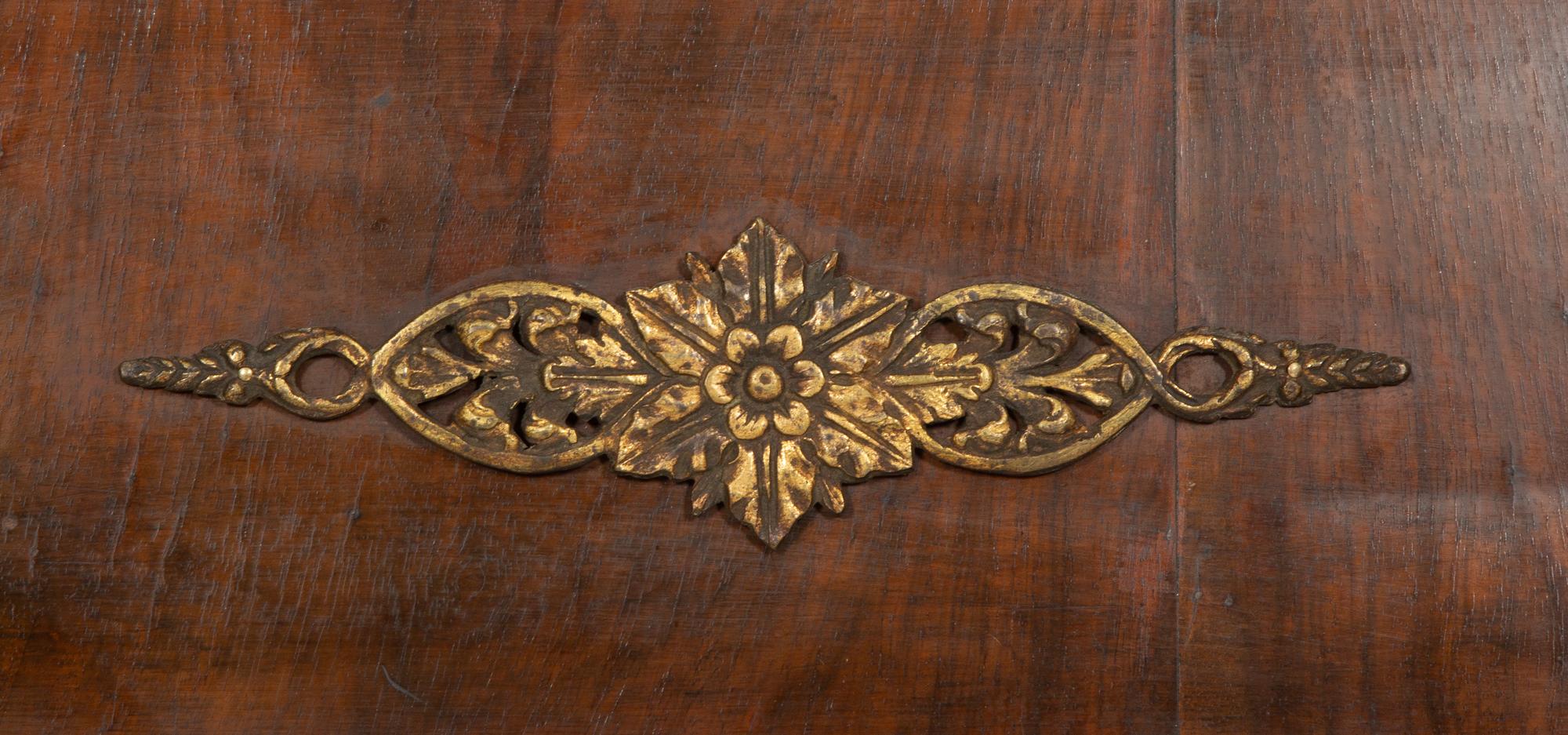 An Empire Gilt Metal Mounted Mahogany Mirro r