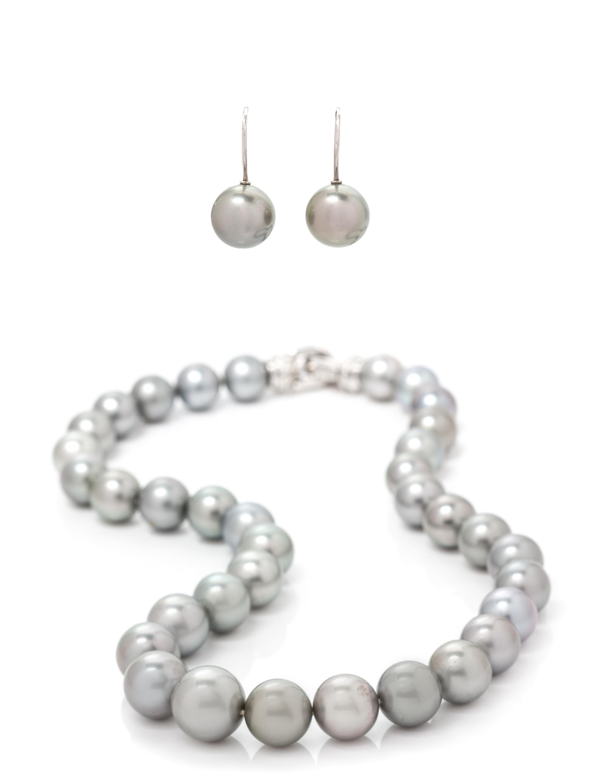 A Collection of 18 Karat White Gold, Diamond and Cultured Tahitian Pearls, 65.20 dwts.