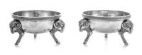 A Pair of American Silver Salts, Tiffany & Co., New York, NY, Mid-19th Century, each having a Greek meander decorated rim above the bod
