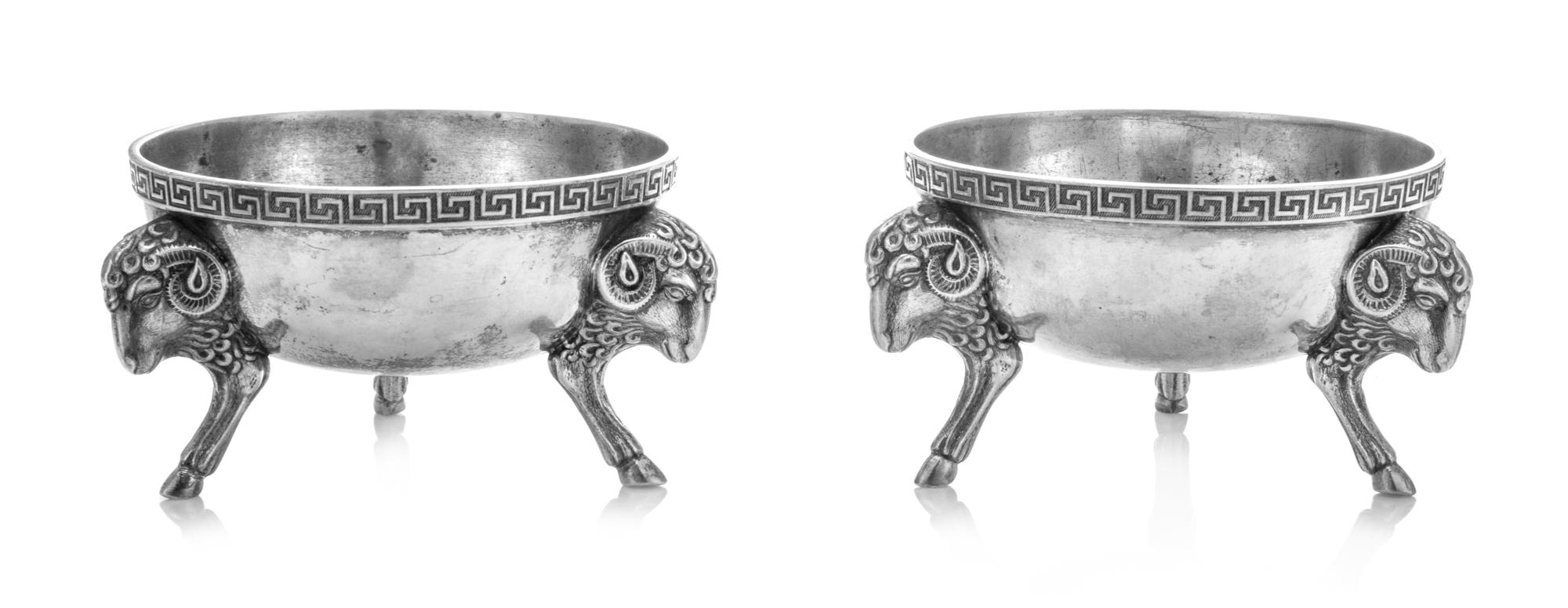 A Pair of American Silver Salts, Tiffany & Co., New York, NY, Mid-19th Century, each having a Greek meander decorated rim above the bod