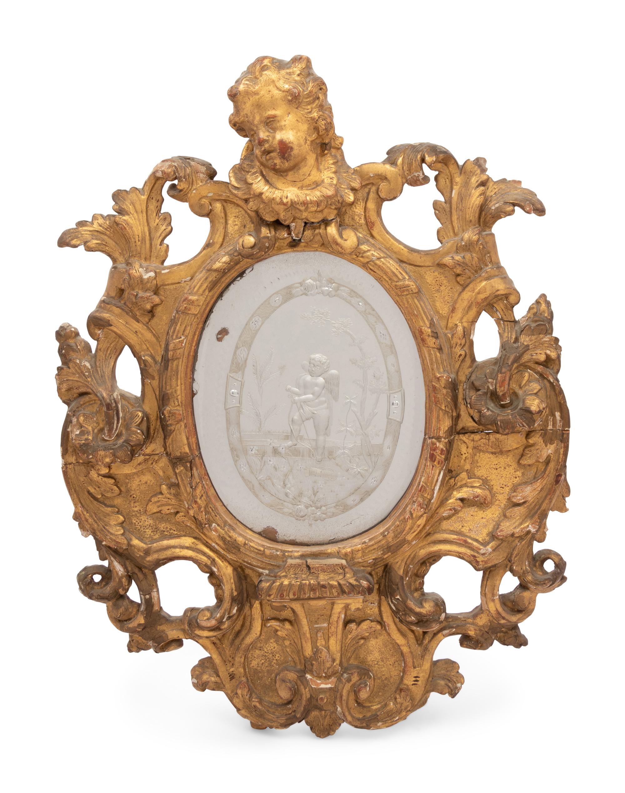 A Venetian Giltwood and Etched Glass Mirror