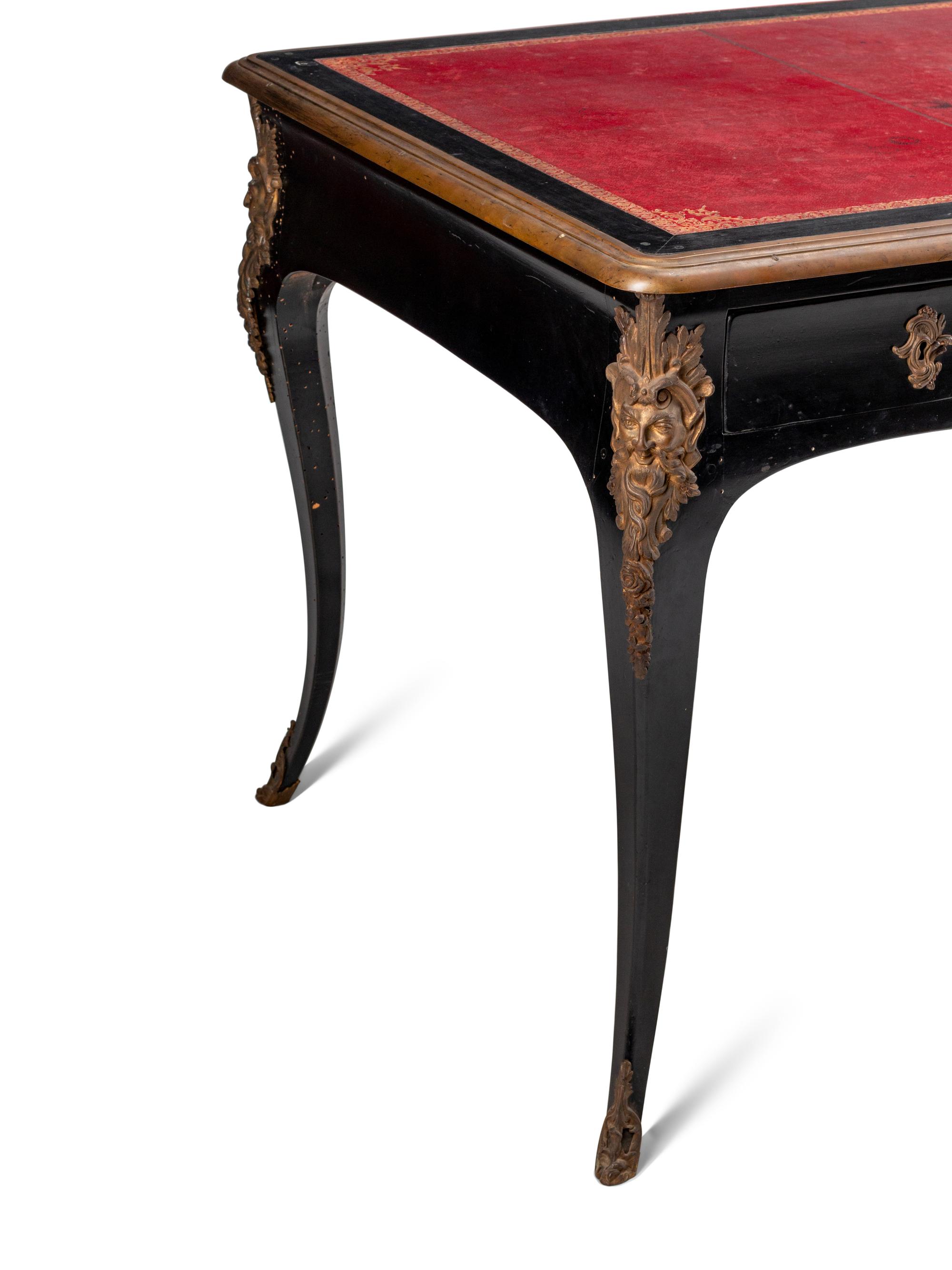 A Louis XV Gilt Bronze Mounted Ebonized Bureau Plat