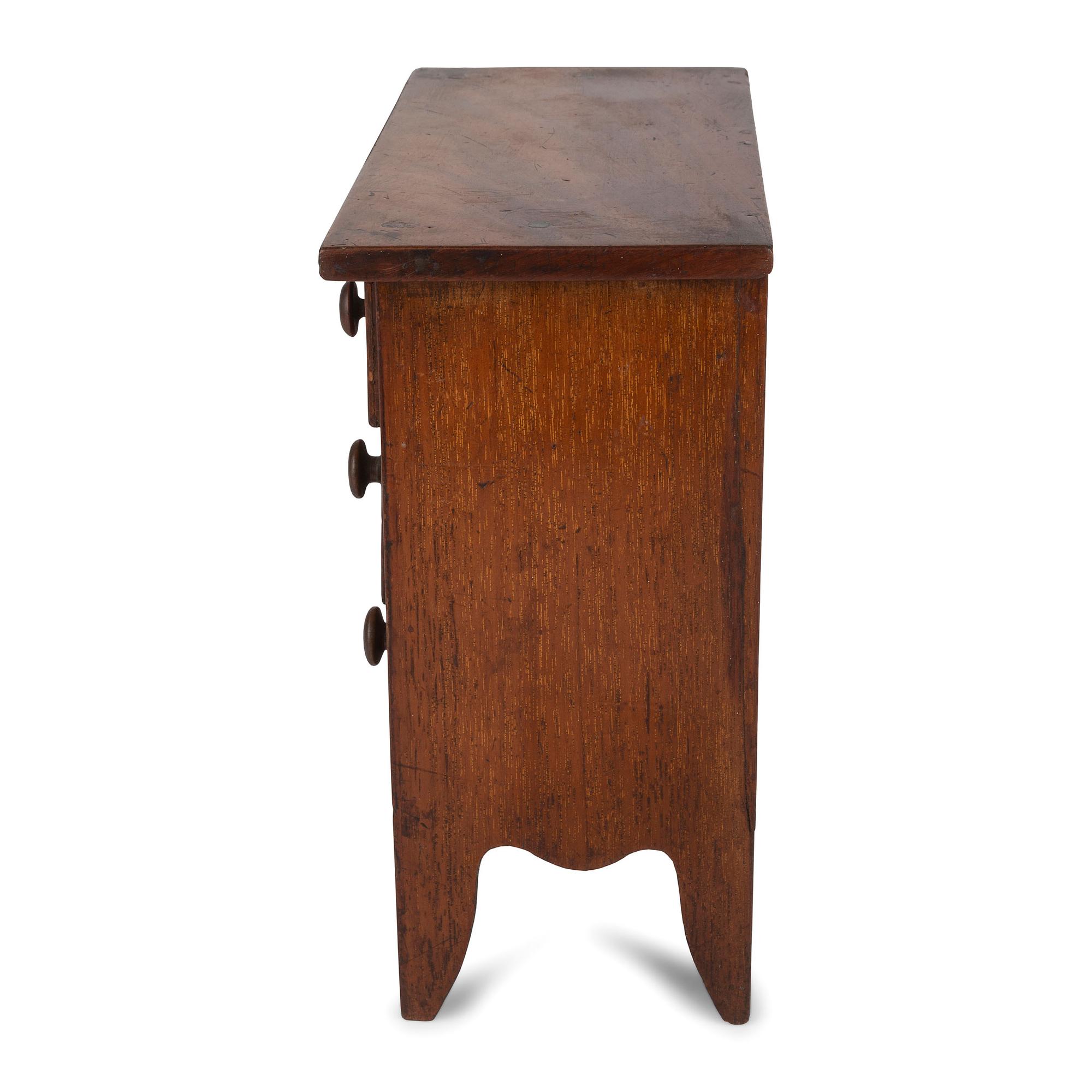 A Federal Inlaid and Carved Cherrywood Diminutive Chest of Drawers