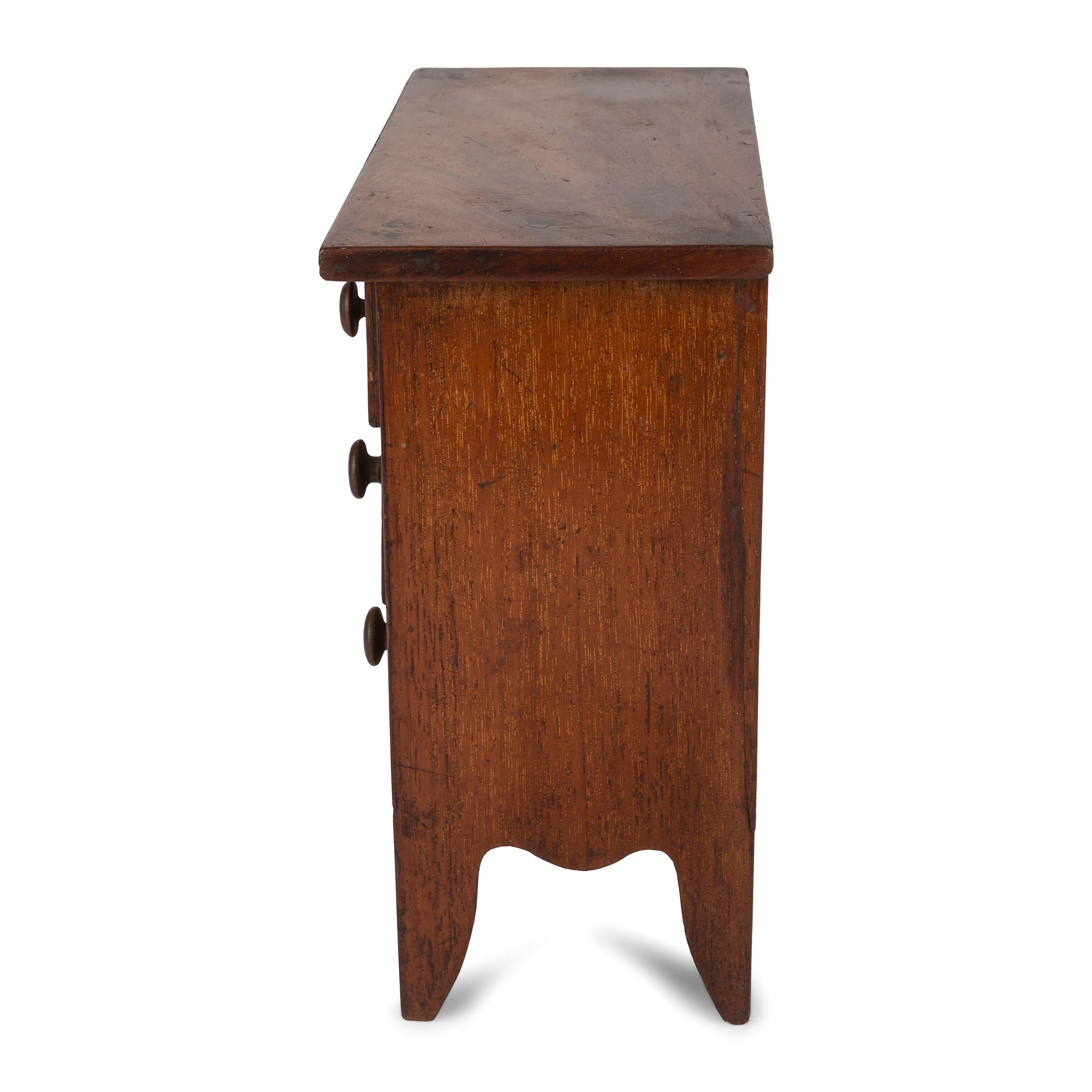 A Federal Inlaid and Carved Cherrywood Diminutive Chest of Drawers