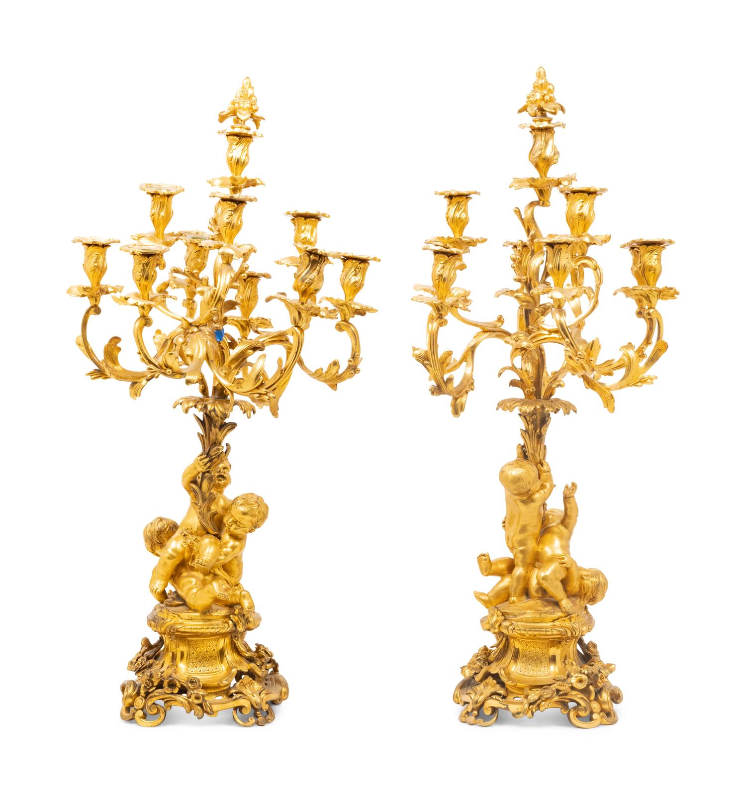 A Pair of Louis XV Style Gilt Bronze Figural Ten-Light Candelabra