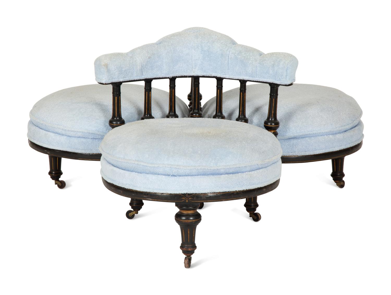A Victorian Ebonized and Gilt Decorated Tête-à-Tête