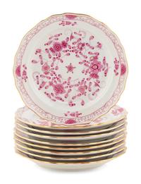 A Set of Nine Meissen Porcelain Dessert Plates