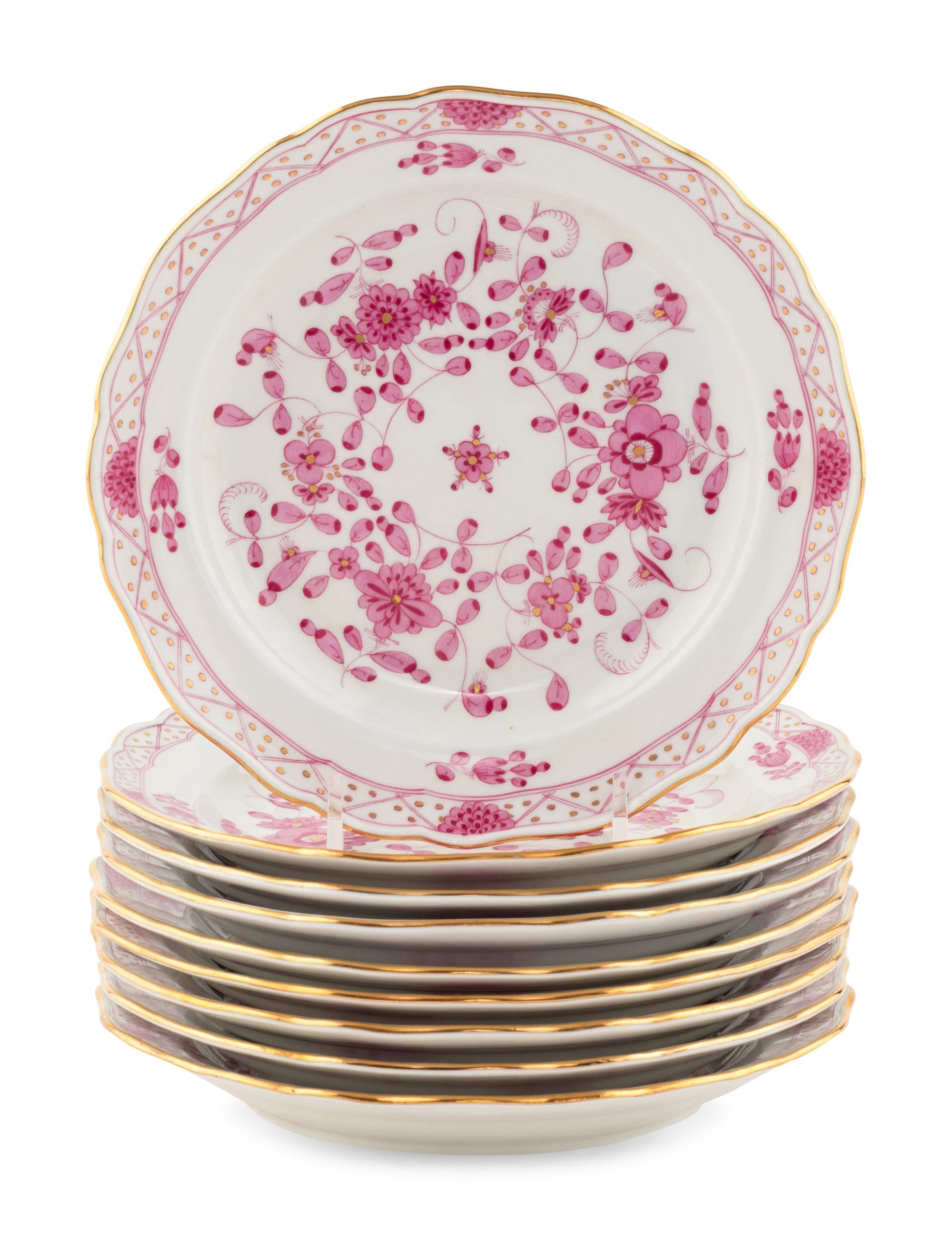 A Set of Nine Meissen Porcelain Dessert Plates