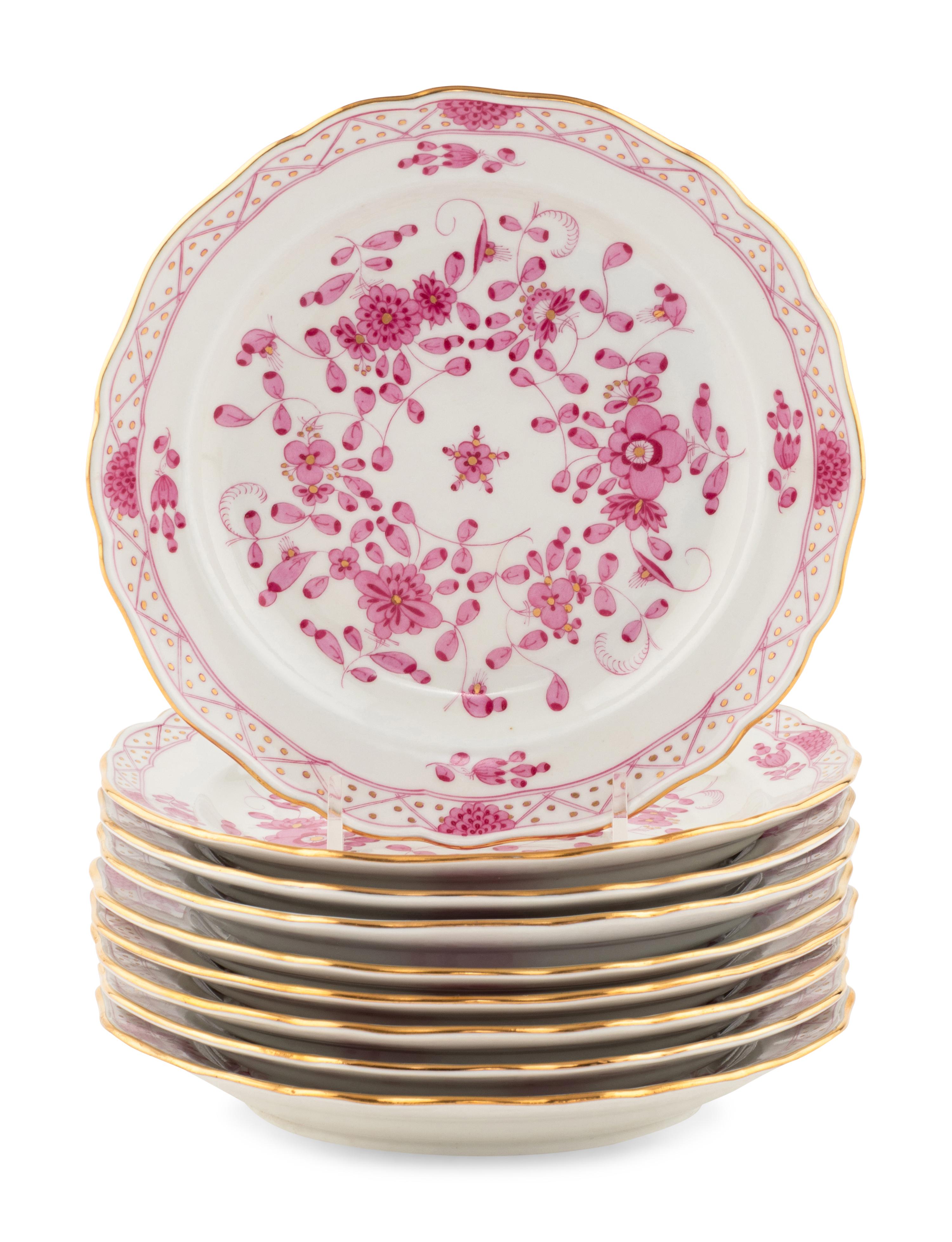 A Set of Nine Meissen Porcelain Dessert Plates
