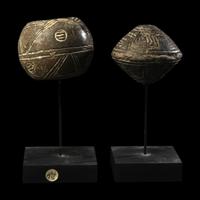 Two Anglo-Saxon Terracotta Spindle Whorls