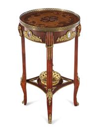 A Gilt Metal Mounted Side Table in the Manner of Adam Weisweiler