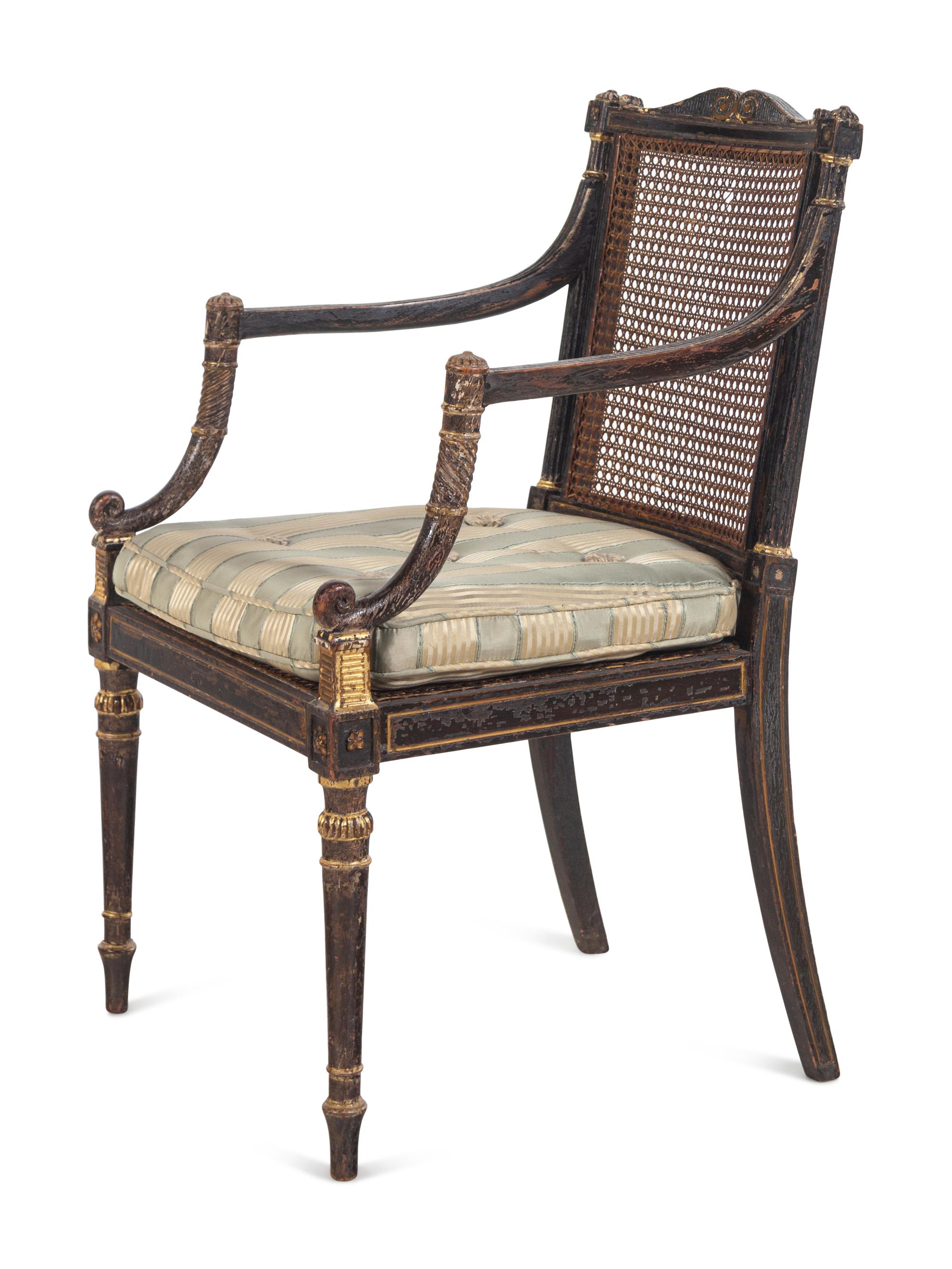 A George III Painted and Parcel-Gilt Caned Armchair