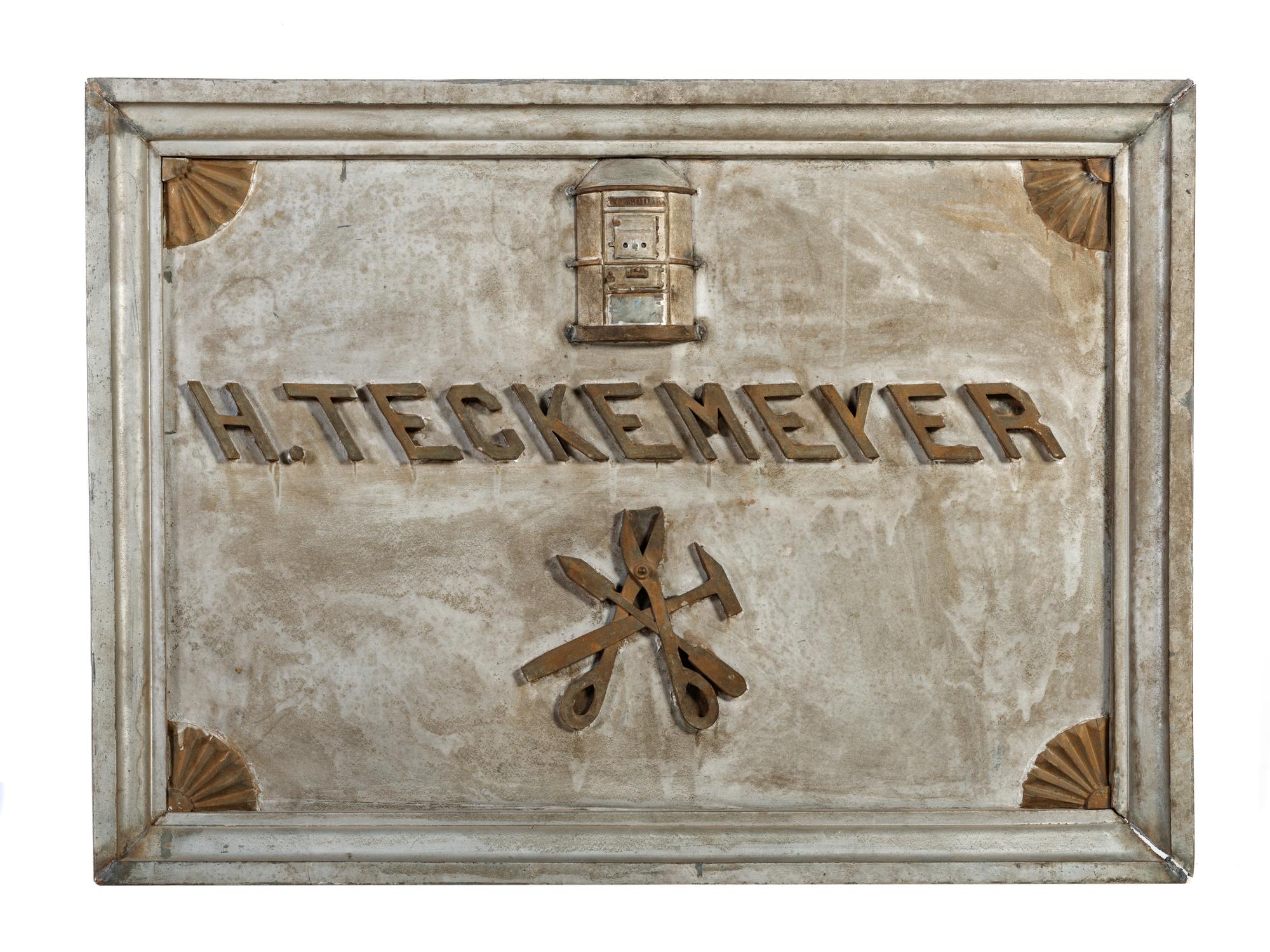 A Galvanized Metal H. Teckemeyer Round Oak Heating Stove Advertising Sign