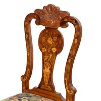 A Set of Eight Dutch Rococo Style Marquetry Dining Chairs
