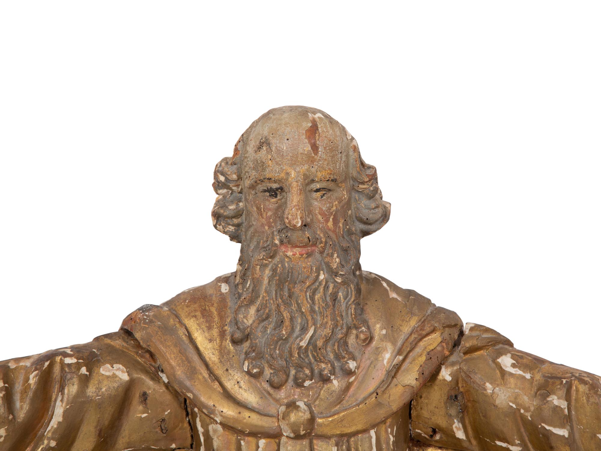 A Continental Painted and Parcel Gilt Carved Figure of a Saint with Outstretched Arms