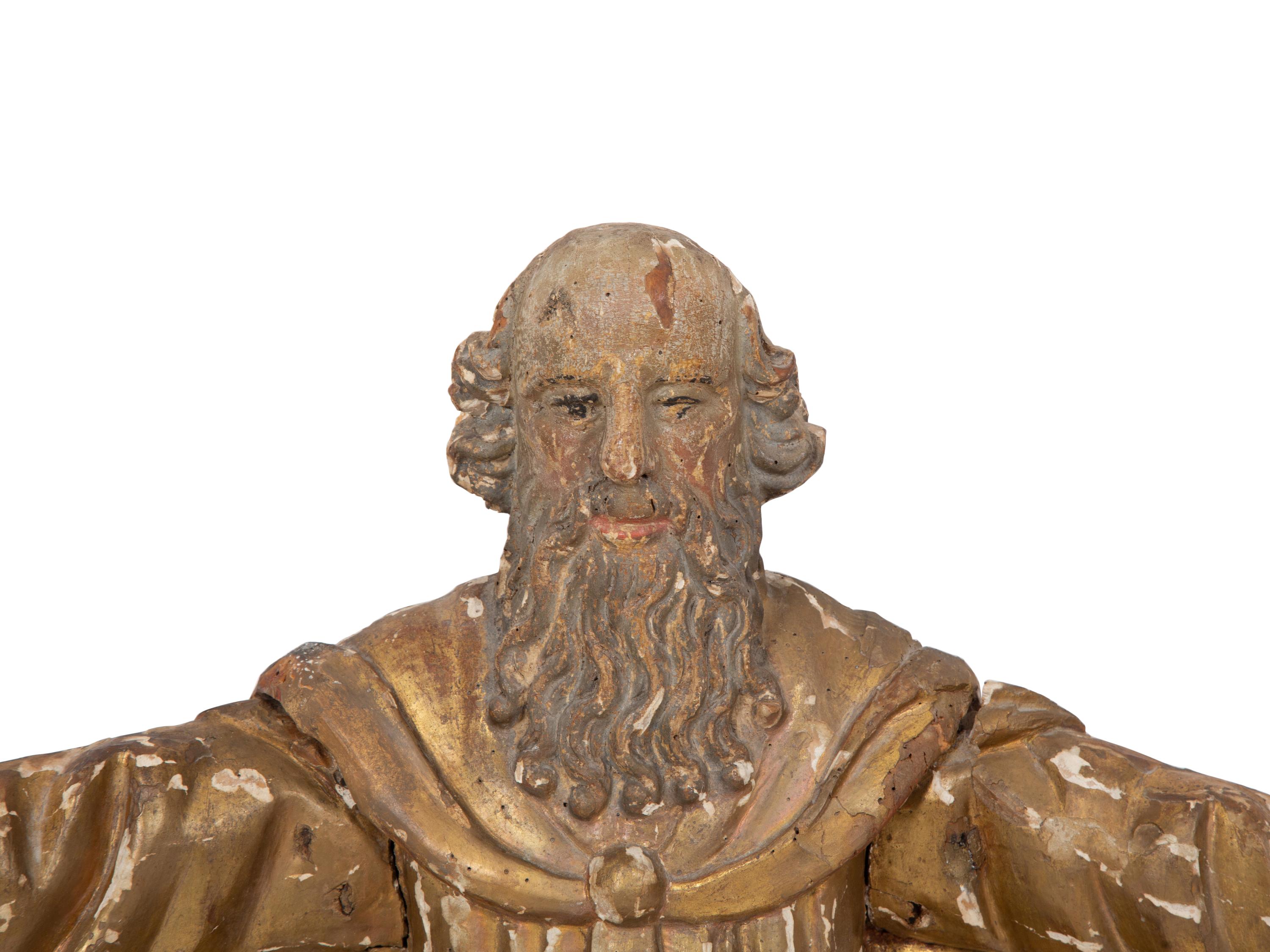 A Continental Painted and Parcel Gilt Carved Figure of a Saint with Outstretched Arms