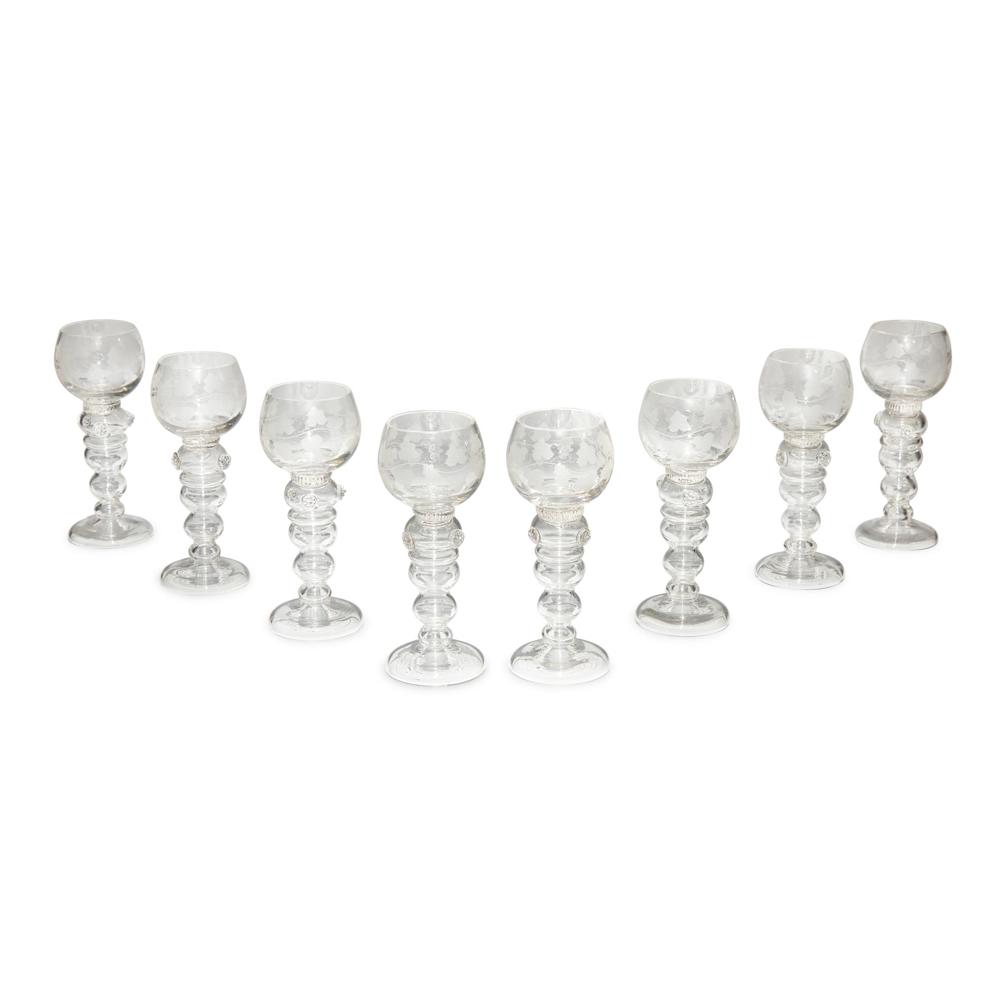 A Set of Eight Blown and Etched Glass Wine Glasses