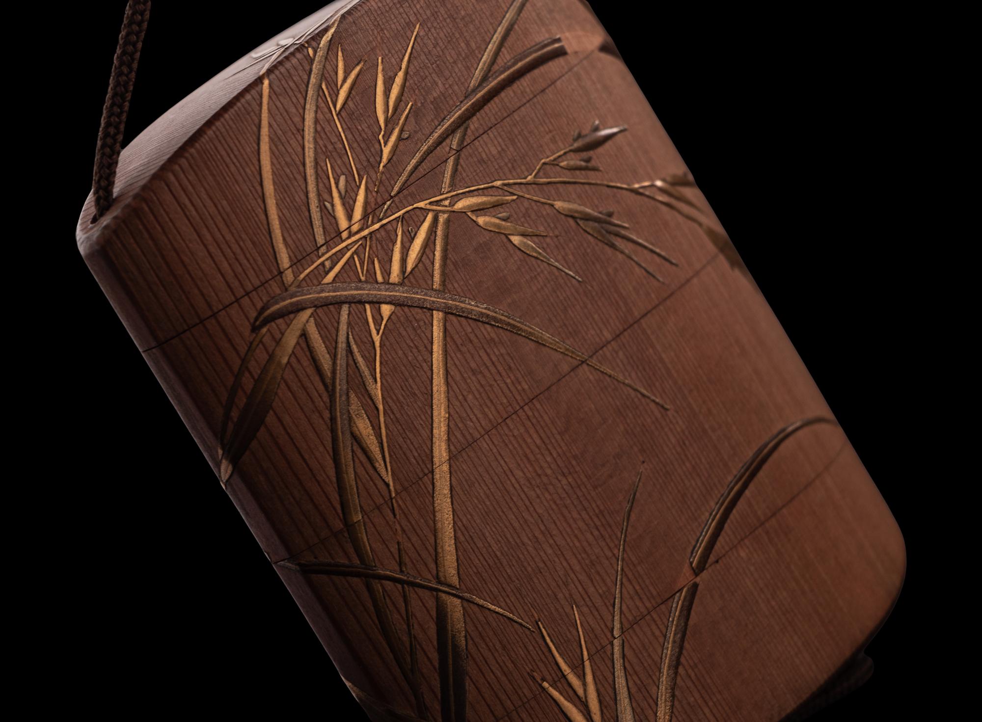 A Japanese Gold Decorated Wood Three-Case Inro