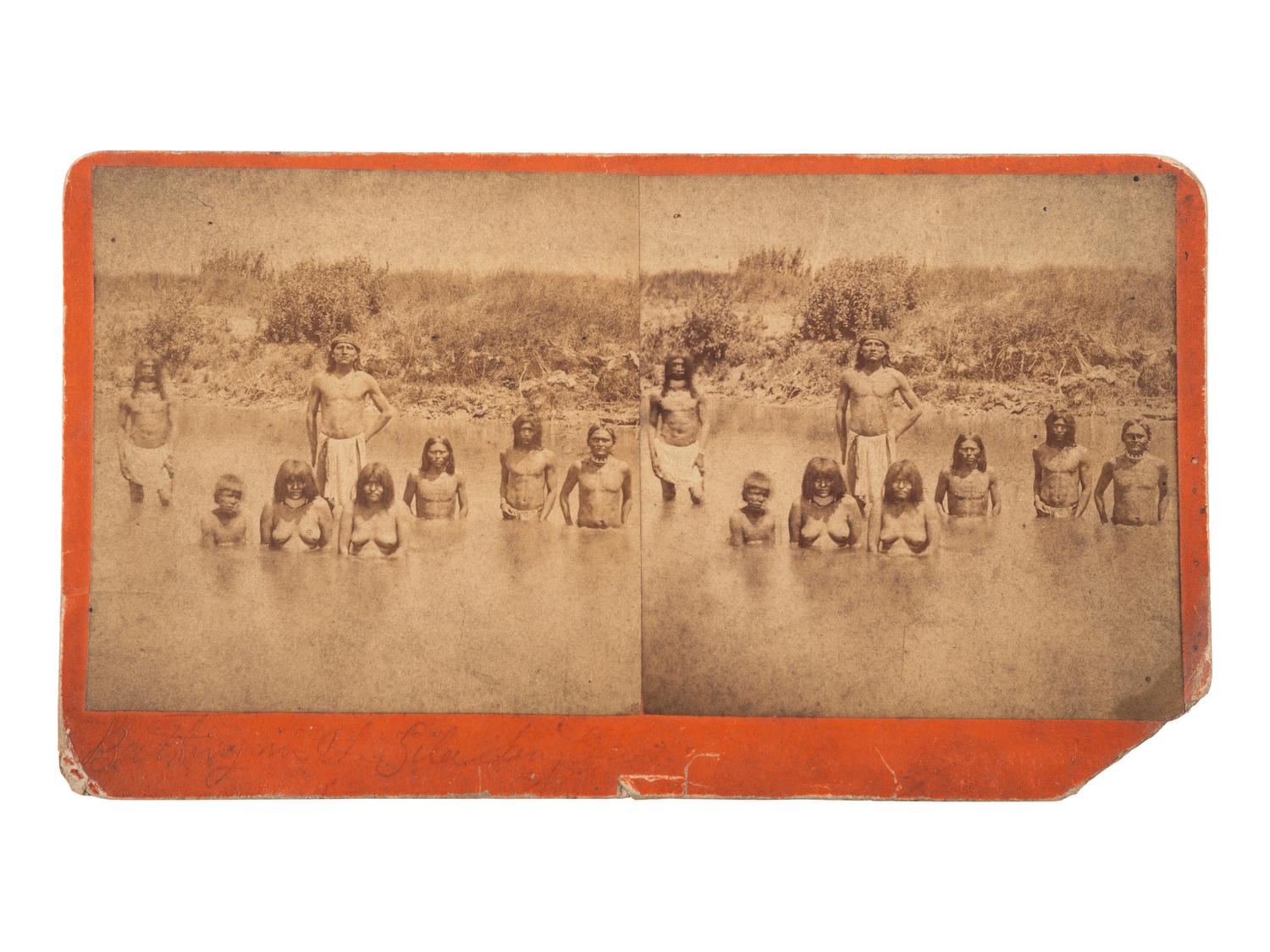 [NATIVE AMERICANS]. BURGE, J.C. (ca 1839-1897), photographer. Stereoview of Apaches bathing in the Gila. Globe City, AZ. Early 1880s.