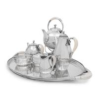 A Georg Jensen Cosmos Seven-Piece Silver Tea and Coffee Service