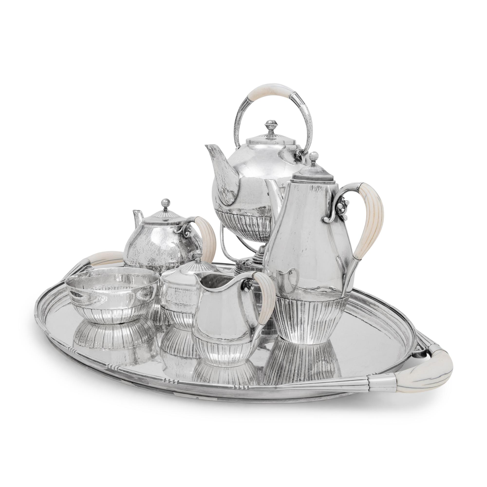 A Georg Jensen Cosmos Seven-Piece Silver Tea and Coffee Service