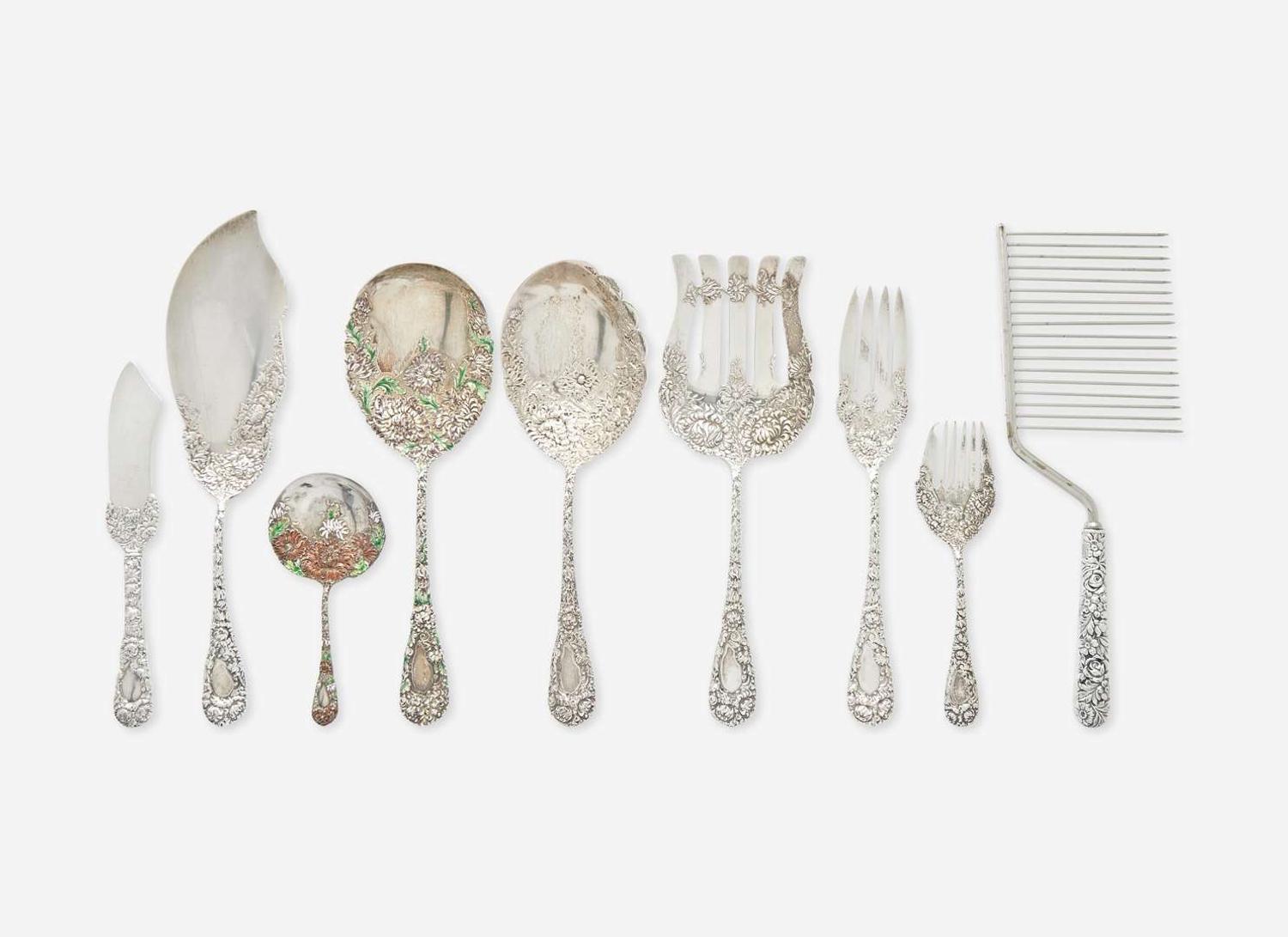An assembled group of nine sterling silver floral repousse serving utensils, various makers, including Bailey Banks & Biddle Co. and J.E. Caldwell & Co., Philadelphia, PA, and The James R. Armiger Co., Baltimore, MD, and others, late 19th / early 20th century