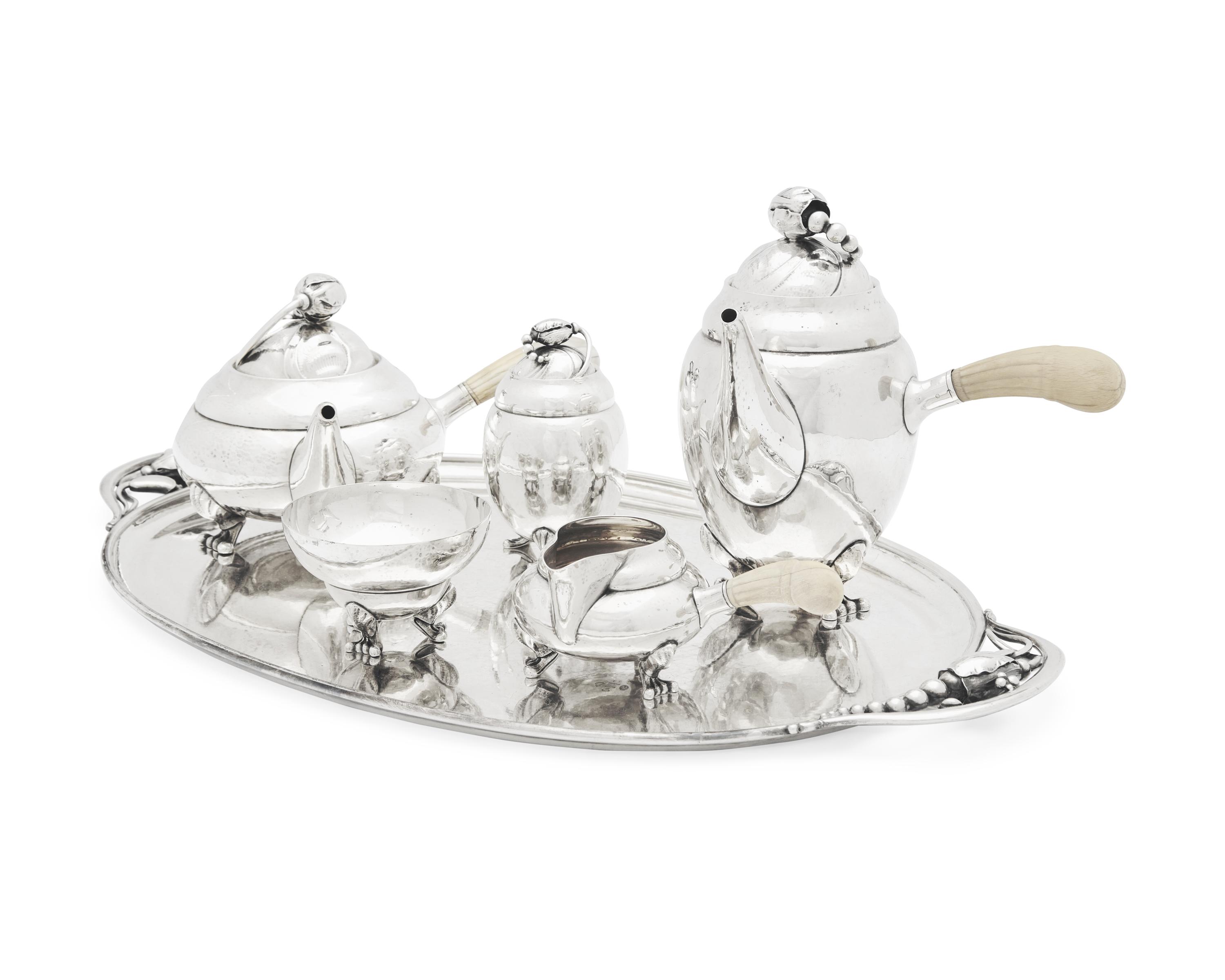 A Georg Jensen Silver Blossom Pattern Six-Piece Tea and Coffee Service