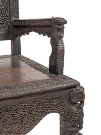 A Burmese Carved Hardwood Armchair