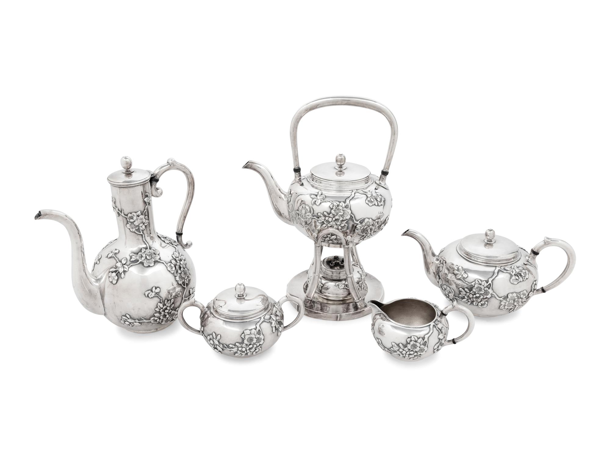 A Japanese Silver Five-Piece Tea and Coffee Service