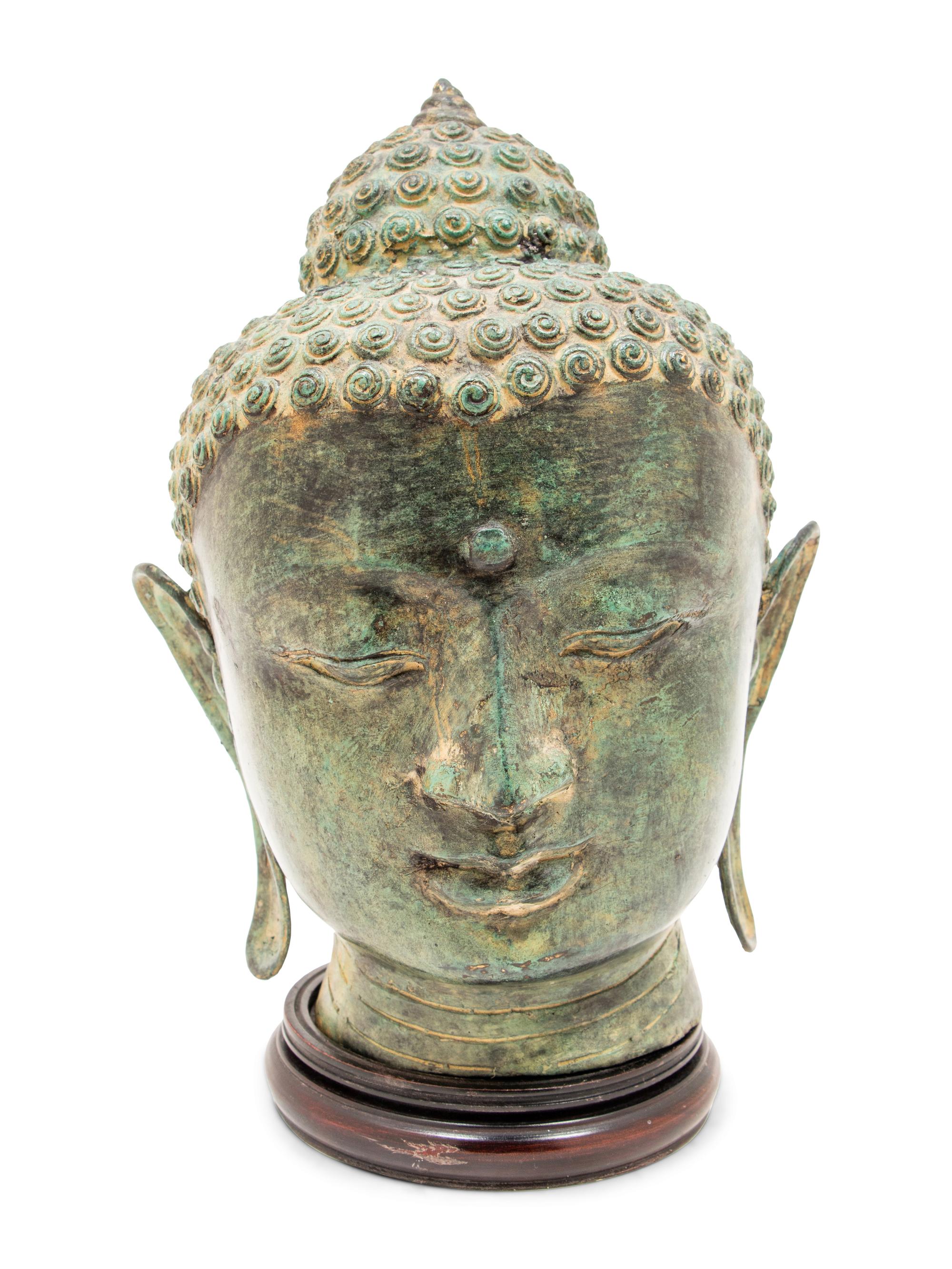 A Pair of Southeast Asian Deity Heads