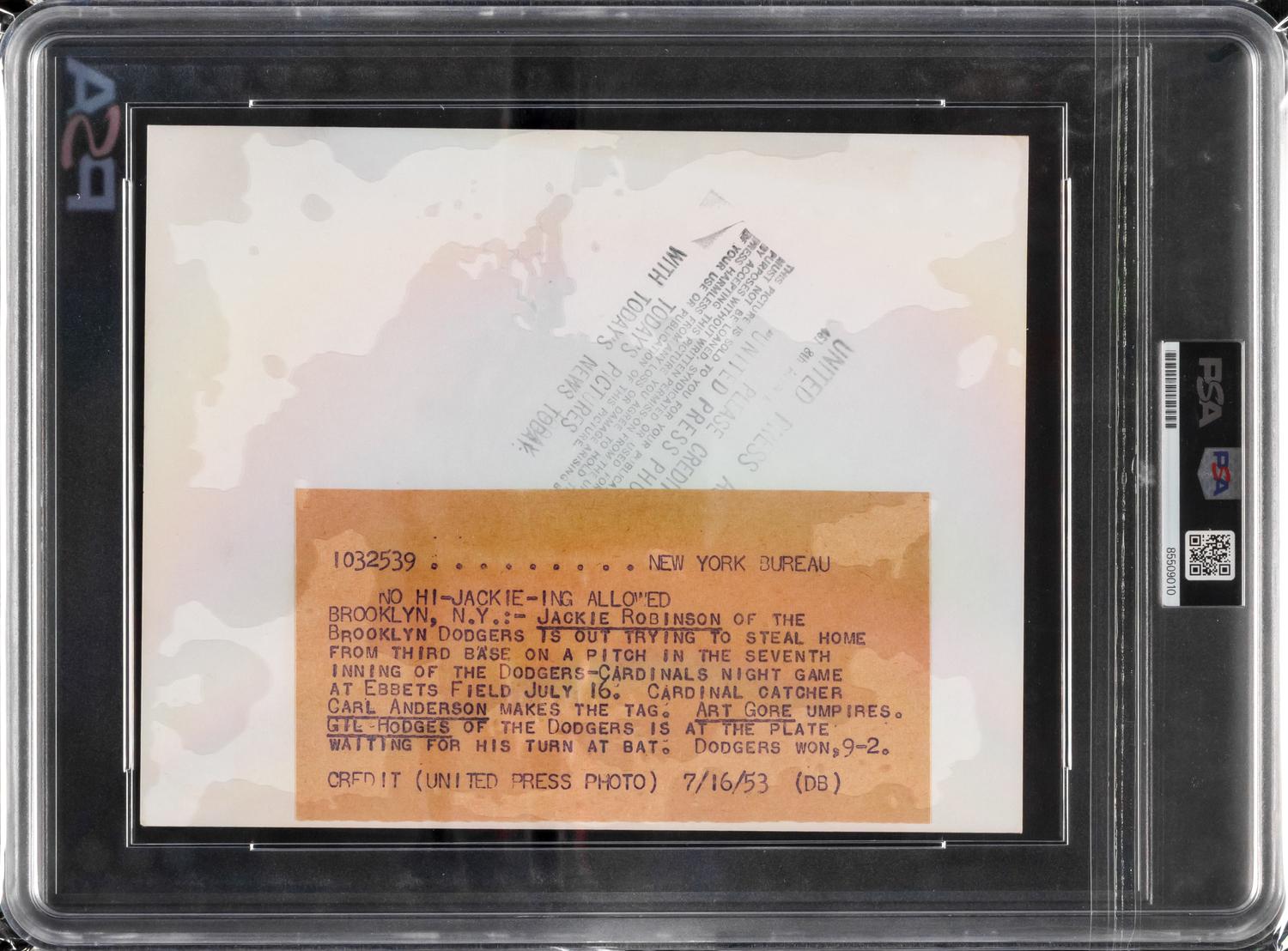 An Original 1953 Jackie Robinson Out At Home Type One United Press News Photograph (PSA)