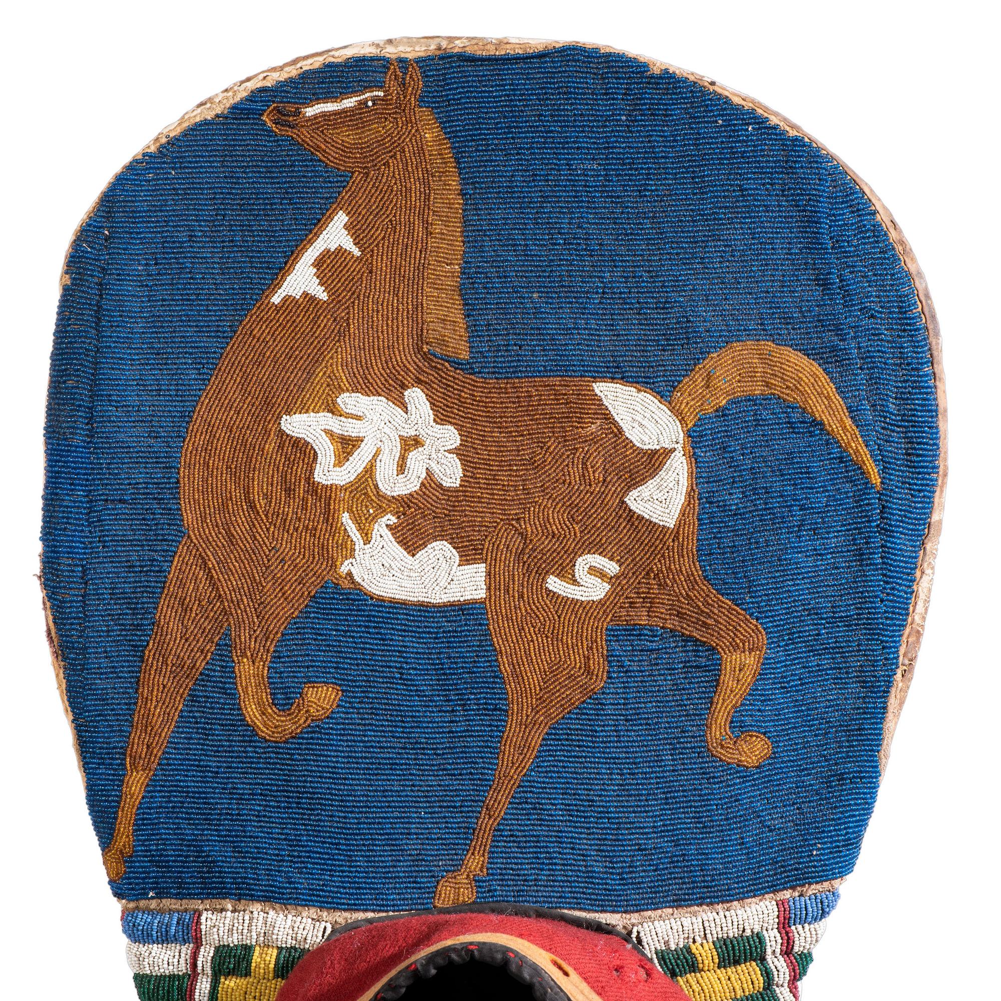 Plateau Child's Beaded Hide Cradleboard, with Pinto Horse