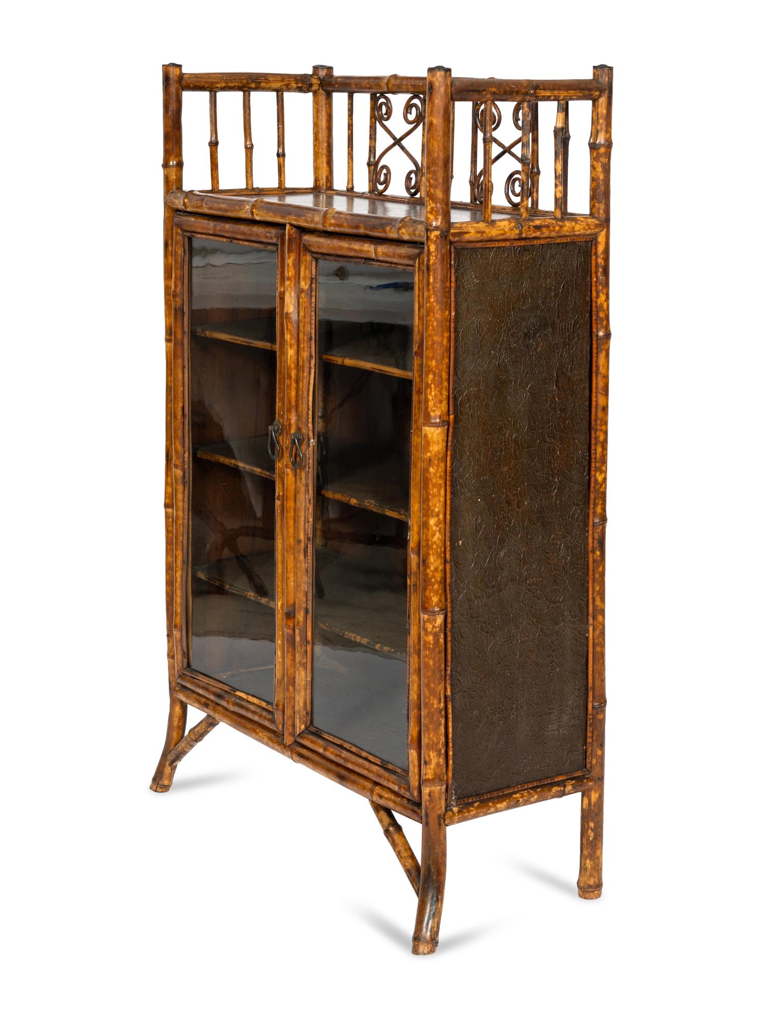 An Edwardian Bamboo and Japanese Lacquer Bookcase
