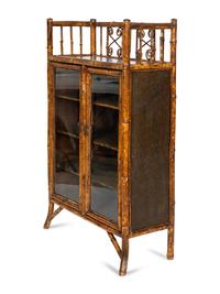 An Edwardian Bamboo and Japanese Lacquer Bookcase