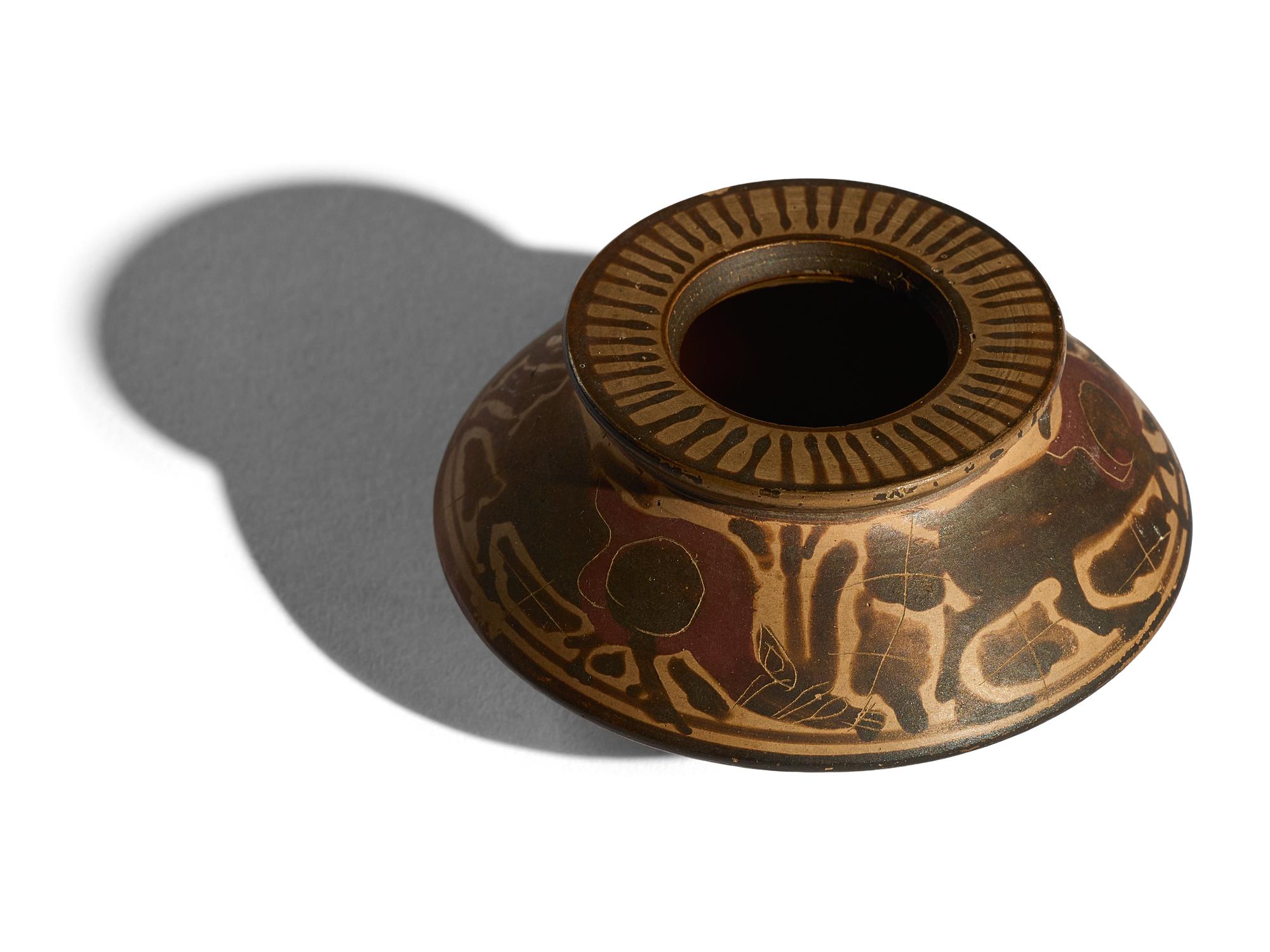 A Corinthian Black-Figured Vessel