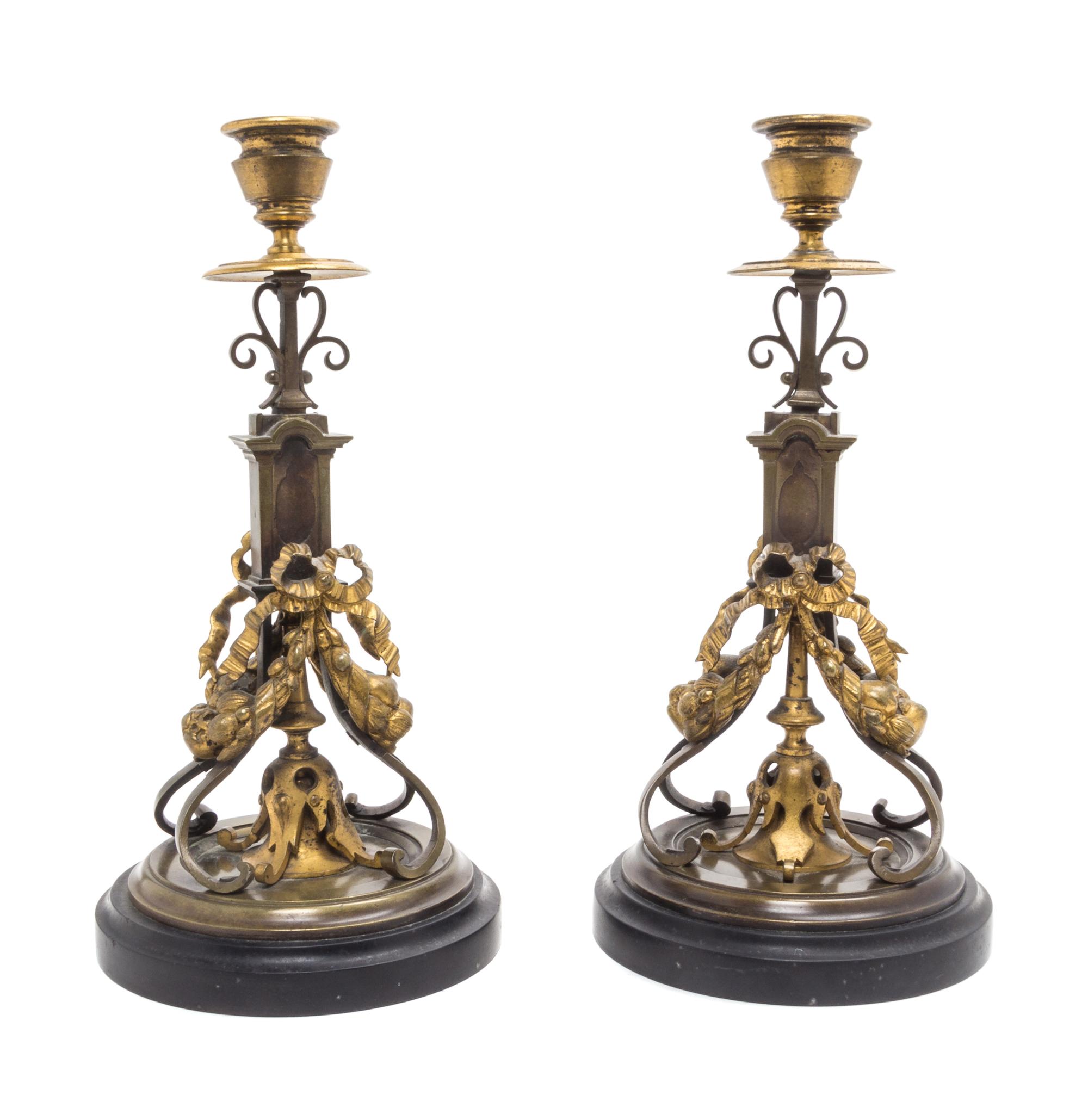 A Pair of Continental Gilt Bronze Candlesticks Height 10 1/4 inches. — 19TH CENTURY
